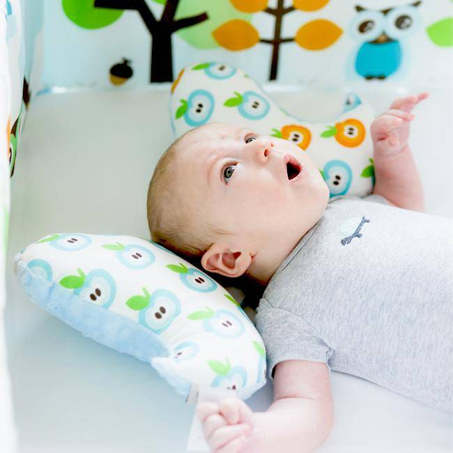 Ортопедическая подушка «бабочка» для новорожденных. особенности использования