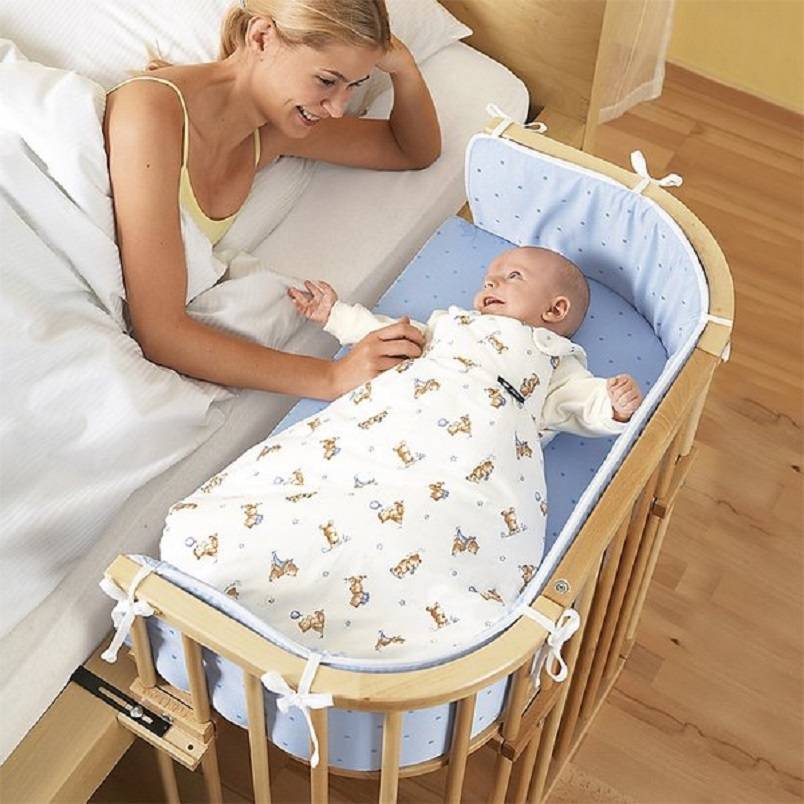 Кровати для новорожденных, их виды и советы по подбору